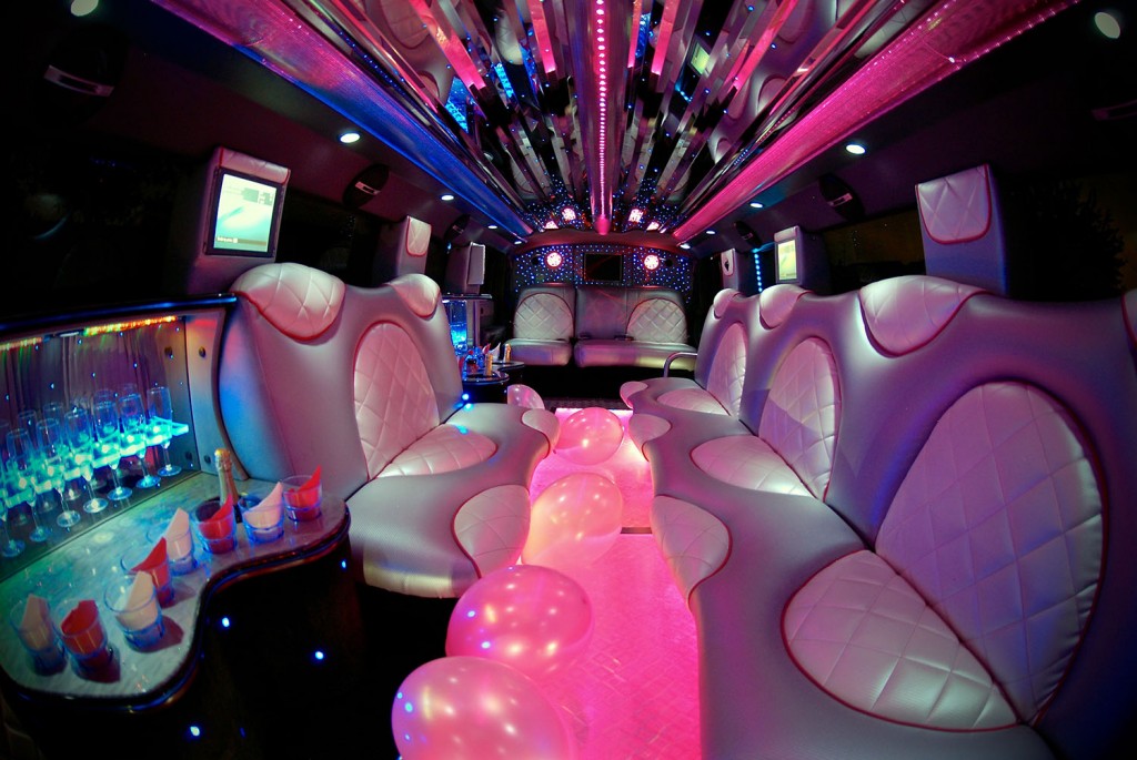 STRETCHED PINK HUMMER LIMO HIRE IN AREAHERE COUNTYHERE - 1st Class Limos